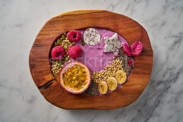 Acai bowl smoothie with passion fruit and raspberries Stock photo © lunamarina