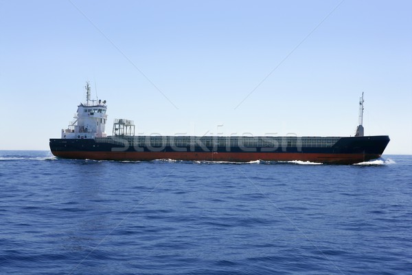 Carbo boat in a blues sea and sky Stock photo © lunamarina