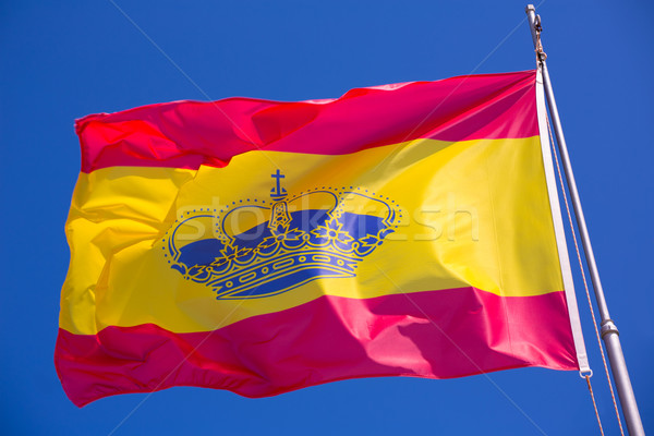 Spain red and yellow flaw waving on wind Stock photo © lunamarina