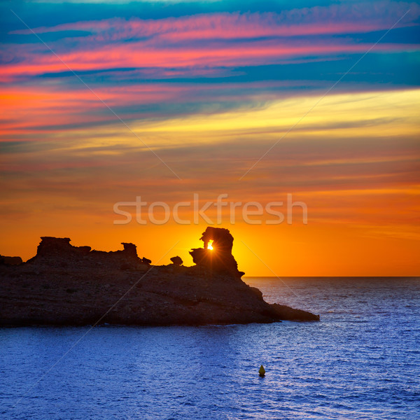 Menorca sunset in Cala Morell at Ses torretes beach Stock photo © lunamarina