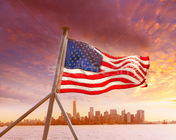 Manhattan skyline New York with American flag US Stock photo © lunamarina