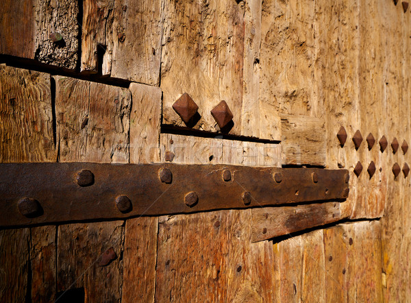 Ancient wooden door in Valencia Torres de Serranos Stock photo © lunamarina