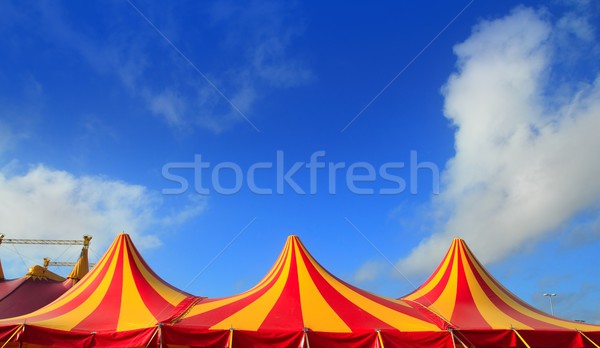 Stock photo: Circus tent red orange and yellow stripped pattern