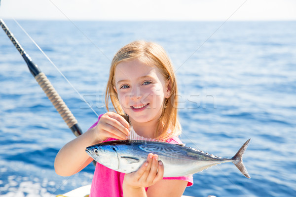 Szőke gyerek lány halászat tonhal kicsi Stock fotó © lunamarina