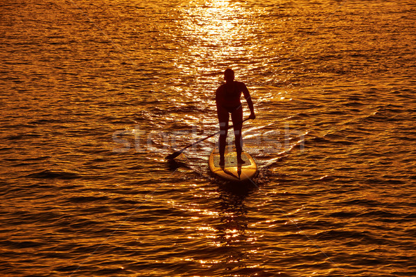 Stand up surf ragazza acqua felice Foto d'archivio © lunamarina