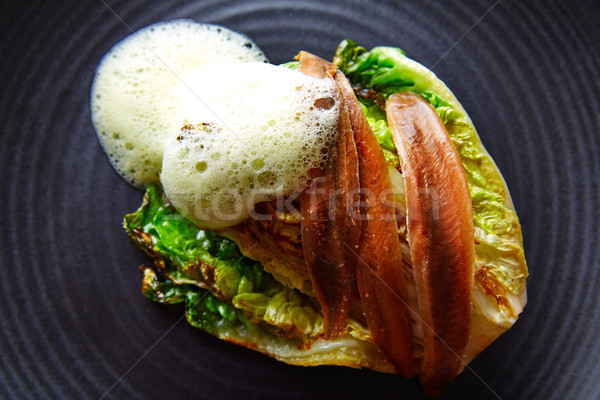 Cantabrian anchovies with endive vinaigrette Stock photo © lunamarina