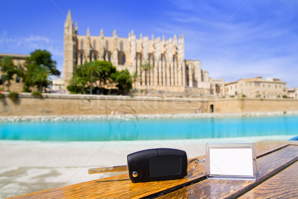 Stock photo: Car rental keys on wood table in Palma de Mallorca cathedral