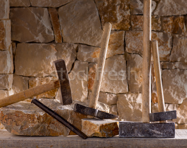 Hammer tools of stonecutter masonry work Stock photo © lunamarina