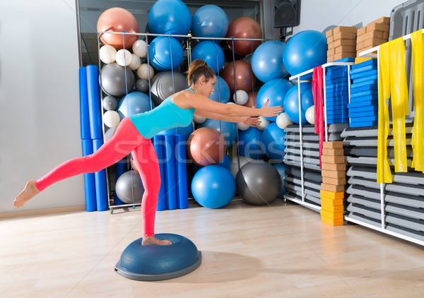 Stock photo: bosu one leg extension deadlift girl exercise