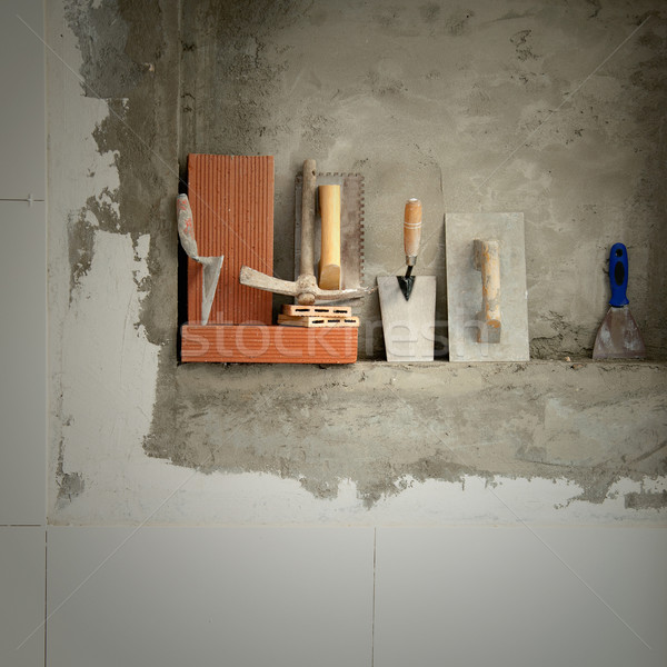 Bouw metselaar cement tools rij gebouw Stockfoto © lunamarina