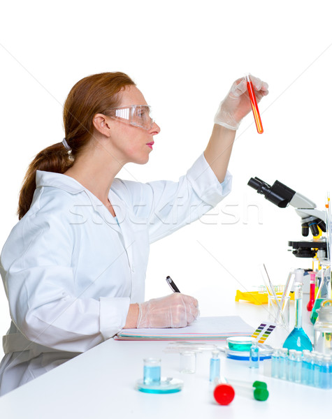 chemical laboratory scientist woman with test tube Stock photo © lunamarina