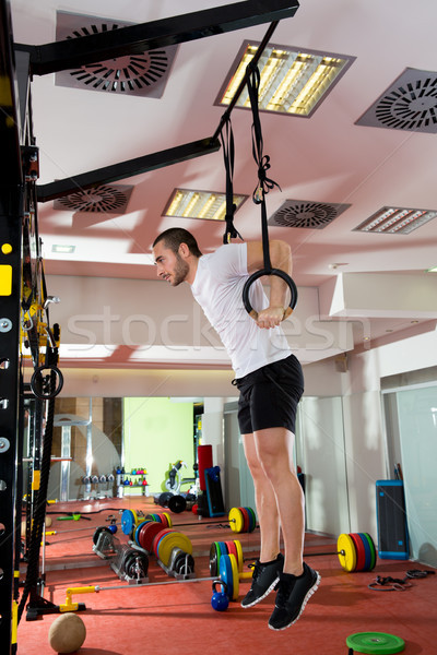 Crossfit fitness dip ring man dipping exercise workout Stock photo © lunamarina