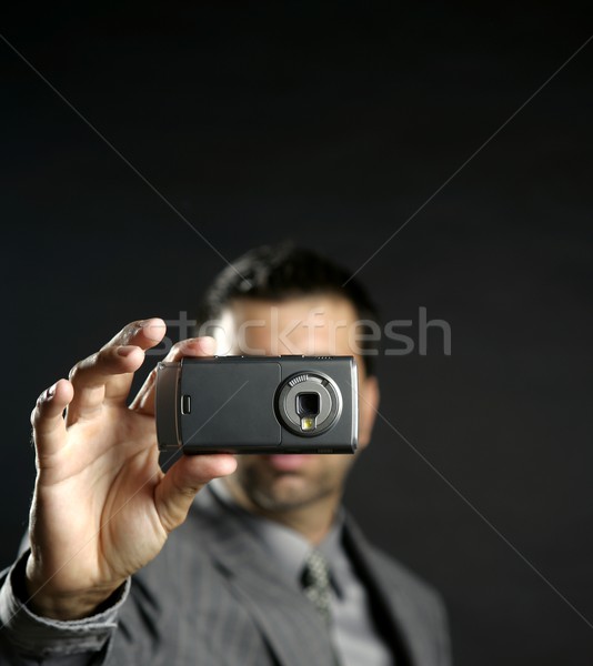 Stockfoto: Zakenman · foto's · mobiele · camera · zwarte