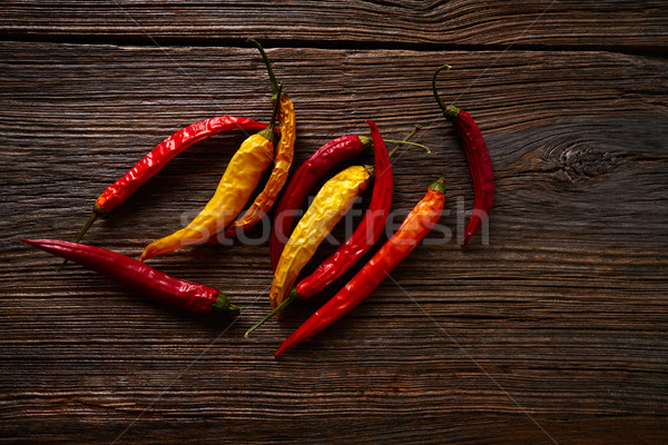 dried hot chili peppers on aged wood Stock photo © lunamarina