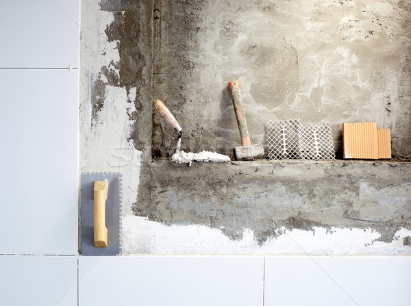 construction tools notched trowel and hammer Stock photo © lunamarina