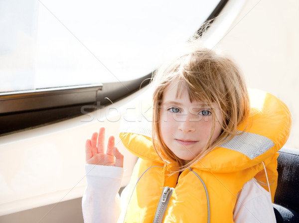 blond kid girl with marine yellow lifesaver jacket Stock photo © lunamarina