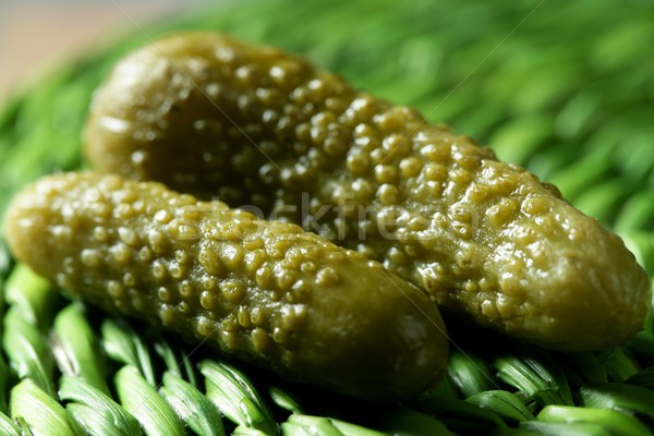 Green pickles macro studio shot, textured skin Stock photo © lunamarina