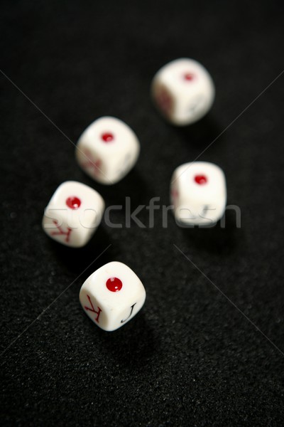Poker game dices over black table Stock photo © lunamarina
