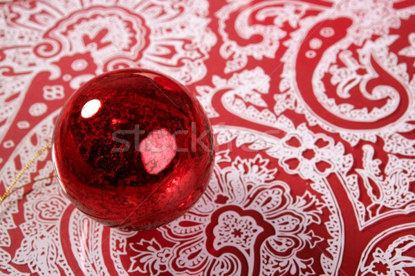 Chrsitmas red ball over indian pattern Stock photo © lunamarina