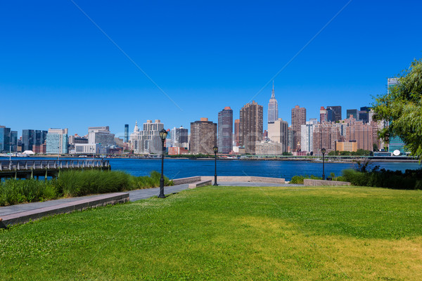 Manhattan New York ensoleillée Skyline rivière jardin [[stock_photo]] © lunamarina
