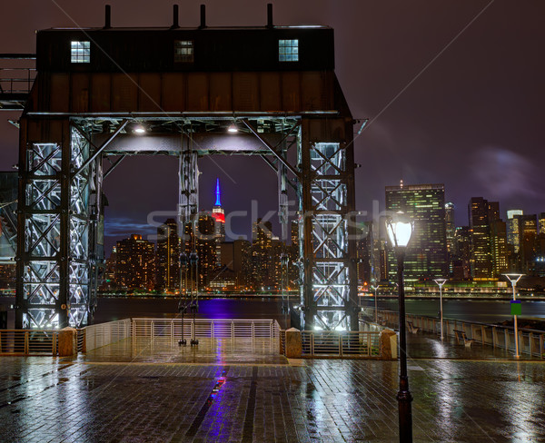 Manhattan Нью-Йорк Skyline дождливый реке ночь Сток-фото © lunamarina