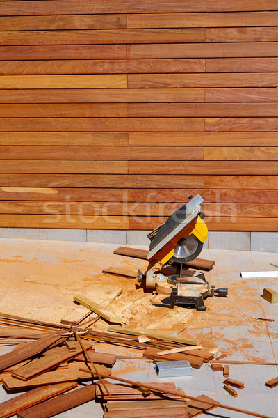 Stock photo: Ipe wood fence installation carpenter table saw