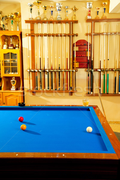 Billiard club with blue pool table cue and trophy Stock photo © lunamarina