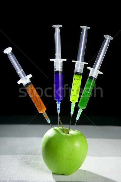 apple manipulation with syringes Stock photo © lunamarina