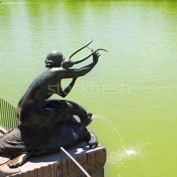 Madrid Sirena con Lira statue in Retiro lake Stock photo © lunamarina