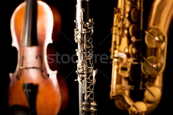 Music Sax tenor saxophone violin and clarinet in black Stock photo © lunamarina