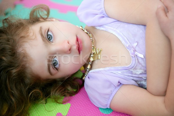 Beautiful blue eyes little girl lying on floor Stock photo © lunamarina