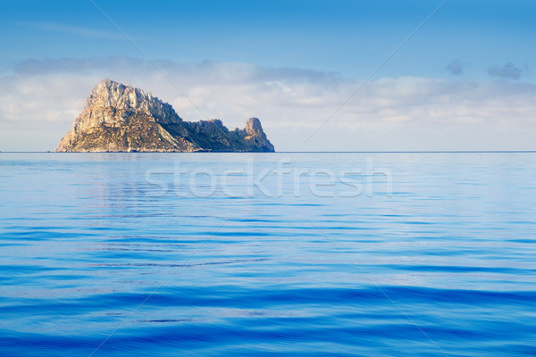 Ibiza Es Vedra island in calm blue water Stock photo © lunamarina