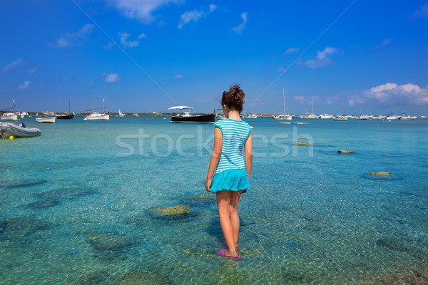 Kid girl walking at Formetera in Estany des Peix Stock photo © lunamarina