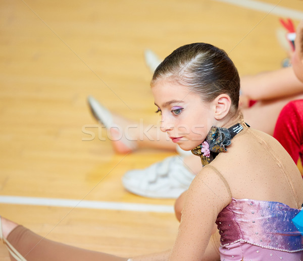 kid girl rhythmic gymnastics on wooden deck Stock photo © lunamarina