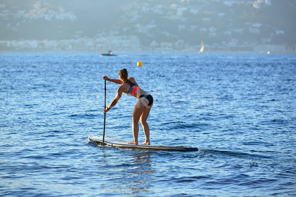 Stand up surf ragazza cielo acqua Foto d'archivio © lunamarina