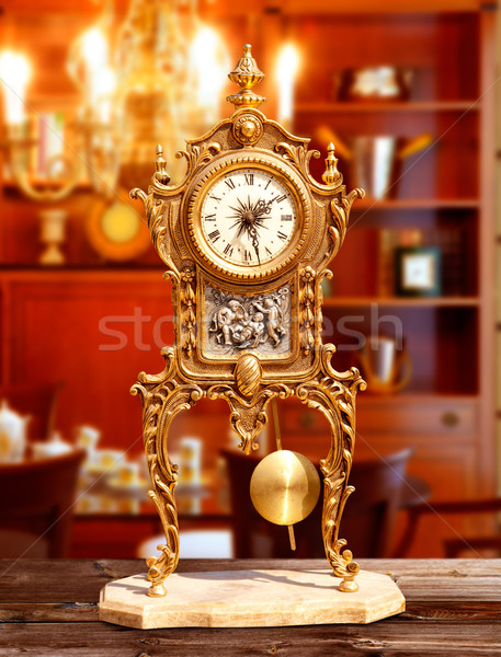 Starożytnych vintage mosiądz wahadło zegar klasyczny Zdjęcia stock © lunamarina
