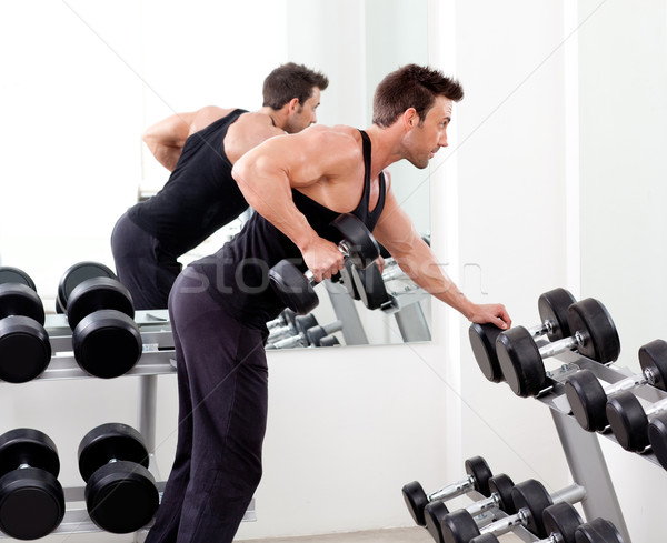 Férfi súlyzós edzés felszerlés sport tornaterem klub Stock fotó © lunamarina