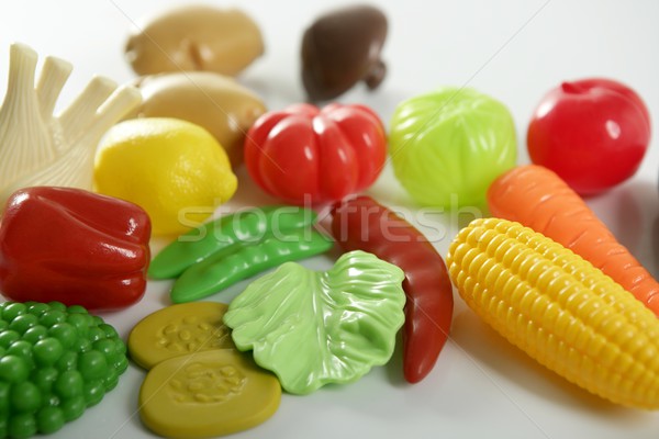 Plastic game, fake varied vegetables and fruits Stock photo © lunamarina