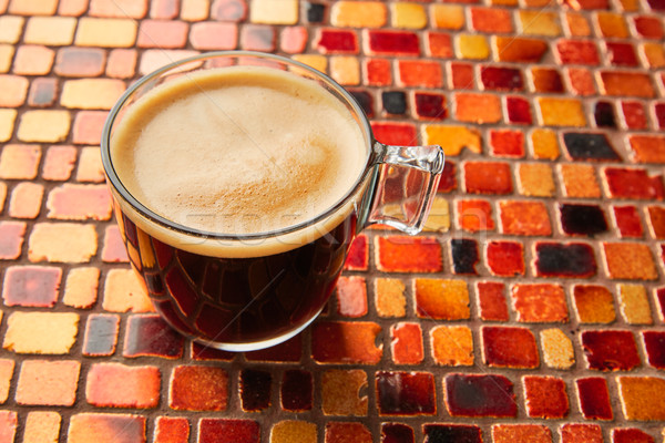 Coffee glass cup with cream on tiles red table Stock photo © lunamarina