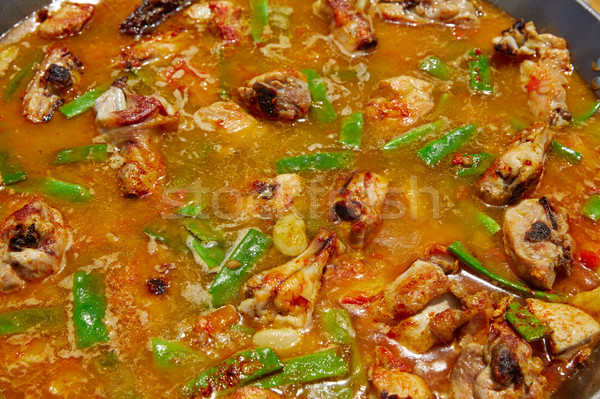 Paella from Spain recipe process ad water Stock photo © lunamarina