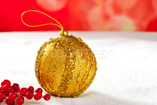 Stock photo: Christmas card of golden bauble berries on snow