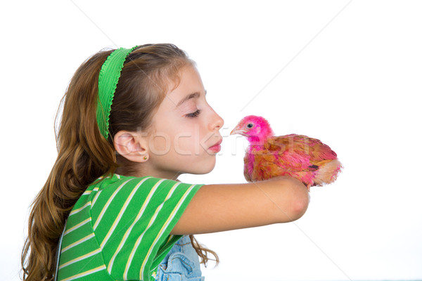 breeder hens kid girl rancher farmer kissing a chicken chick Stock photo © lunamarina