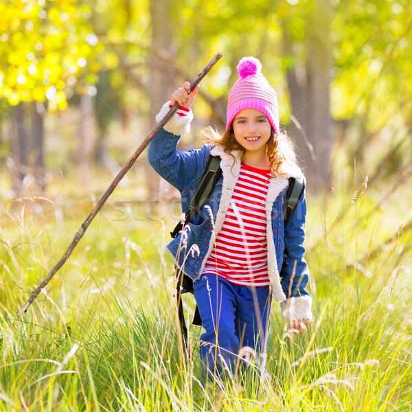 Hiking kid girl with backpack in autum poplar forest Stock photo © lunamarina