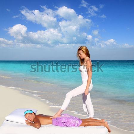 beach woman floating lounge pink tropical Caribbean Stock photo © lunamarina