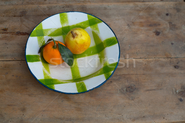 fruits tangerine and pear in vintage porcelain dish plate retro Stock photo © lunamarina