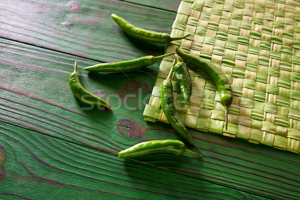 Stock photo: Green chili peppers in monochrome rustic table