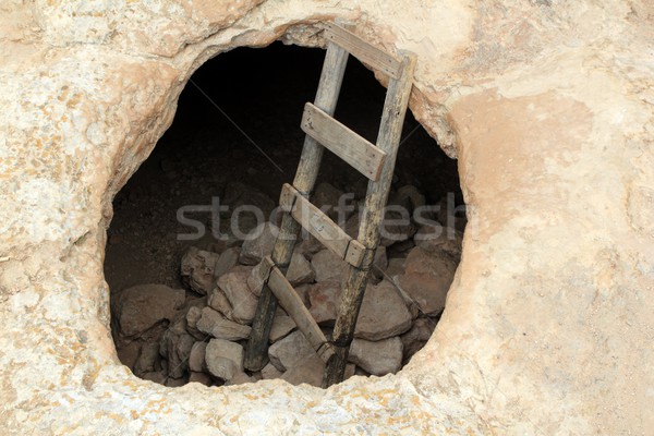 Barbaria cape cave hole aged wood steps Stock photo © lunamarina