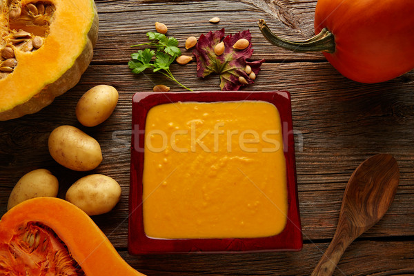 Pumpkin soup cream on wood Stock photo © lunamarina