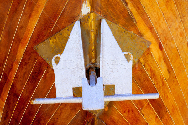 anchor detail in silver color on a wooden hull Stock photo © lunamarina