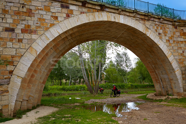 Zamora bridge and bike pilgrim of Via de la Plata Stock photo © lunamarina